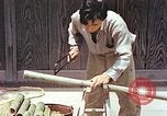 Standbild japanische Arbeiter Kyoto Japan, 1946, aus Sekunde 10 historischem Filmmaterial Videoclip 65675060731