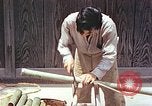 Standbild japanische Arbeiter Kyoto Japan, 1946, aus Sekunde 12 historischem Filmmaterial Videoclip 65675060731