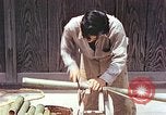 Standbild japanische Arbeiter Kyoto Japan, 1946, aus Sekunde 13 historischem Filmmaterial Videoclip 65675060731