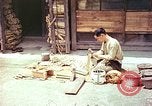 Standbild japanische Arbeiter Kyoto Japan, 1946, aus Sekunde 14 historischem Filmmaterial Videoclip 65675060731