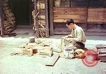 Standbild japanische Arbeiter Kyoto Japan, 1946, aus Sekunde 15 historischem Filmmaterial Videoclip 65675060731