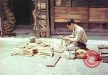 Standbild japanische Arbeiter Kyoto Japan, 1946, aus Sekunde 19 historischem Filmmaterial Videoclip 65675060731