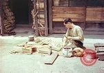 Standbild japanische Arbeiter Kyoto Japan, 1946, aus Sekunde 22 historischem Filmmaterial Videoclip 65675060731