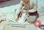 Standbild japanische Arbeiter Kyoto Japan, 1946, aus Sekunde 32 historischem Filmmaterial Videoclip 65675060731