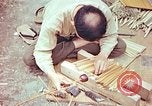 Standbild japanische Arbeiter Kyoto Japan, 1946, aus Sekunde 49 historischem Filmmaterial Videoclip 65675060731