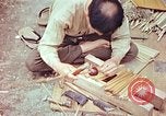 Standbild japanische Arbeiter Kyoto Japan, 1946, aus Sekunde 52 historischem Filmmaterial Videoclip 65675060731