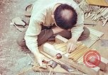 Standbild japanische Arbeiter Kyoto Japan, 1946, aus Sekunde 53 historischem Filmmaterial Videoclip 65675060731