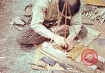 Standbild japanische Arbeiter Kyoto Japan, 1946, aus Sekunde 55 historischem Filmmaterial Videoclip 65675060731