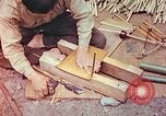 Standbild japanische Arbeiter Kyoto Japan, 1946, aus Sekunde 56 historischem Filmmaterial Videoclip 65675060731