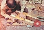 Standbild japanische Arbeiter Kyoto Japan, 1946, aus Sekunde 62 historischem Filmmaterial Videoclip 65675060731