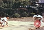 Standbild Judo Übung Japan, 1946, aus Sekunde 25 historischem Filmmaterial Videoclip 65675060737