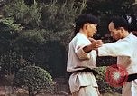 Standbild Judo Übung Japan, 1946, aus Sekunde 52 historischem Filmmaterial Videoclip 65675060737