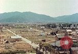 Image attaque incendiaires des dommages Tsuruga Japon, 1946, de la seconde 10 séquences d'archives historiques vidéo 65675060739