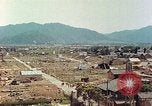 Image attaque incendiaires des dommages Tsuruga Japon, 1946, de la seconde 11 séquences d'archives historiques vidéo 65675060739