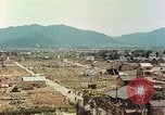 Image attaque incendiaires des dommages Tsuruga Japon, 1946, de la seconde 13 séquences d'archives historiques vidéo 65675060739