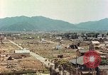 Image attaque incendiaires des dommages Tsuruga Japon, 1946, de la seconde 14 séquences d'archives historiques vidéo 65675060739