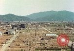 Image attaque incendiaires des dommages Tsuruga Japon, 1946, de la seconde 16 séquences d'archives historiques vidéo 65675060739