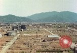 Image attaque incendiaires des dommages Tsuruga Japon, 1946, de la seconde 19 séquences d'archives historiques vidéo 65675060739