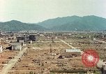 Image attaque incendiaires des dommages Tsuruga Japon, 1946, de la seconde 21 séquences d'archives historiques vidéo 65675060739