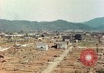 Image attaque incendiaires des dommages Tsuruga Japon, 1946, de la seconde 23 séquences d'archives historiques vidéo 65675060739