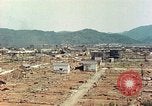 Image attaque incendiaires des dommages Tsuruga Japon, 1946, de la seconde 24 séquences d'archives historiques vidéo 65675060739