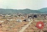Image attaque incendiaires des dommages Tsuruga Japon, 1946, de la seconde 26 séquences d'archives historiques vidéo 65675060739