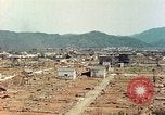Image attaque incendiaires des dommages Tsuruga Japon, 1946, de la seconde 29 séquences d'archives historiques vidéo 65675060739