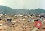 Image attaque incendiaires des dommages Tsuruga Japon, 1946, de la seconde 34 séquences d'archives historiques vidéo 65675060739