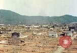 Image attaque incendiaires des dommages Tsuruga Japon, 1946, de la seconde 36 séquences d'archives historiques vidéo 65675060739