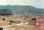 Image attaque incendiaires des dommages Tsuruga Japon, 1946, de la seconde 37 séquences d'archives historiques vidéo 65675060739