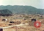 Image attaque incendiaires des dommages Tsuruga Japon, 1946, de la seconde 38 séquences d'archives historiques vidéo 65675060739