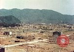 Image attaque incendiaires des dommages Tsuruga Japon, 1946, de la seconde 39 séquences d'archives historiques vidéo 65675060739