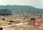 Image attaque incendiaires des dommages Tsuruga Japon, 1946, de la seconde 41 séquences d'archives historiques vidéo 65675060739