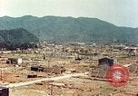 Image attaque incendiaires des dommages Tsuruga Japon, 1946, de la seconde 42 séquences d'archives historiques vidéo 65675060739