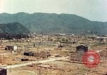 Image attaque incendiaires des dommages Tsuruga Japon, 1946, de la seconde 43 séquences d'archives historiques vidéo 65675060739