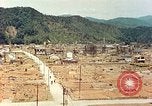 Image attaque incendiaires des dommages Tsuruga Japon, 1946, de la seconde 44 séquences d'archives historiques vidéo 65675060739