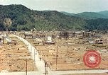 Image attaque incendiaires des dommages Tsuruga Japon, 1946, de la seconde 46 séquences d'archives historiques vidéo 65675060739