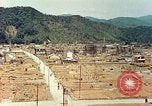 Image attaque incendiaires des dommages Tsuruga Japon, 1946, de la seconde 49 séquences d'archives historiques vidéo 65675060739
