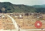 Image attaque incendiaires des dommages Tsuruga Japon, 1946, de la seconde 50 séquences d'archives historiques vidéo 65675060739