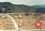 Image attaque incendiaires des dommages Tsuruga Japon, 1946, de la seconde 51 séquences d'archives historiques vidéo 65675060739