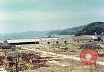 Image attaque incendiaires des dommages Tsuruga Japon, 1946, de la seconde 52 séquences d'archives historiques vidéo 65675060739