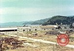 Image attaque incendiaires des dommages Tsuruga Japon, 1946, de la seconde 57 séquences d'archives historiques vidéo 65675060739