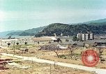 Image attaque incendiaires des dommages Tsuruga Japon, 1946, de la seconde 59 séquences d'archives historiques vidéo 65675060739