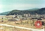 Image attaque incendiaires des dommages Tsuruga Japon, 1946, de la seconde 61 séquences d'archives historiques vidéo 65675060739