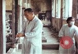 Image of Japanese doctor Nagasaki Japan, 1945, second 38 stock footage video 65675060749