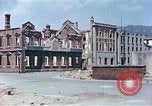Immagine di Gli edifici danneggiati Kobe Giappone, 1946, secondo 52 filmato di repertorio 65675060776