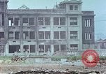 Immagine di Gli edifici danneggiati Kobe Giappone, 1946, secondo 47 filmato di repertorio 65675060778