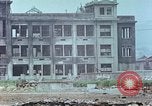 Immagine di Gli edifici danneggiati Kobe Giappone, 1946, secondo 48 filmato di repertorio 65675060778