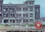Immagine di Gli edifici danneggiati Kobe Giappone, 1946, secondo 53 filmato di repertorio 65675060778