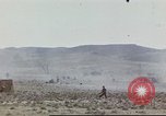 Image of 1st Division soldiers uncover German shoe mines Africa, 1942, second 27 stock footage video 65675060789